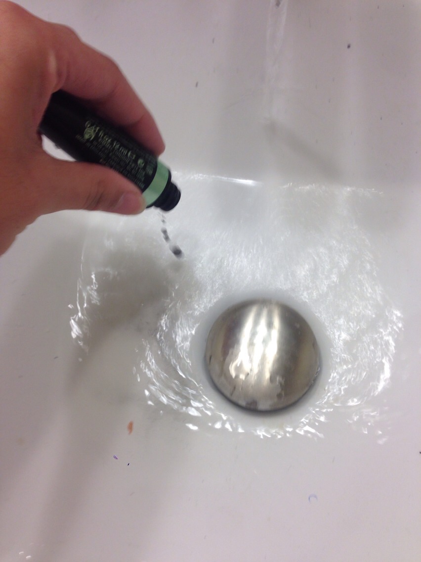 Shake the bottle to let the remaining water out
