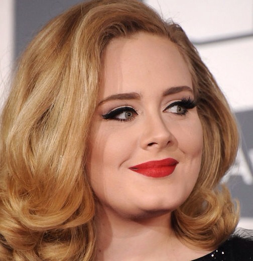 Adele definitely has the right idea for old Hollywood glamour makeup, red lip is a must(or in that area), neutral eye (champagne colour as the base) and a beautiful little wing eyeliner and voluminous eyelashes, with bright cheeks