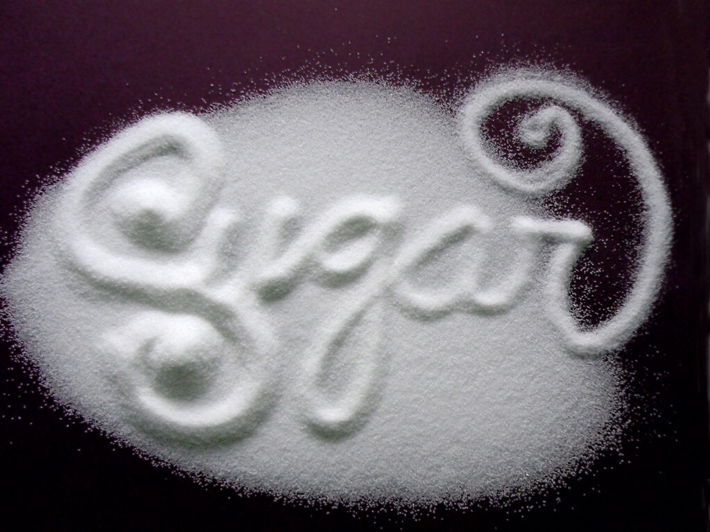 Then put a half spoonful of sugar in the bowl then stir together