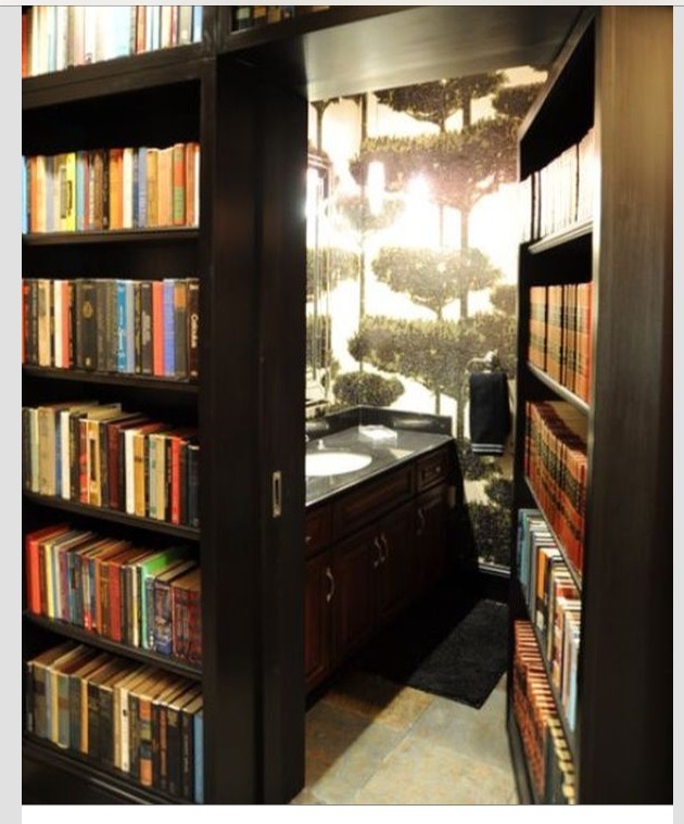 Hidden room behind bookshelves 