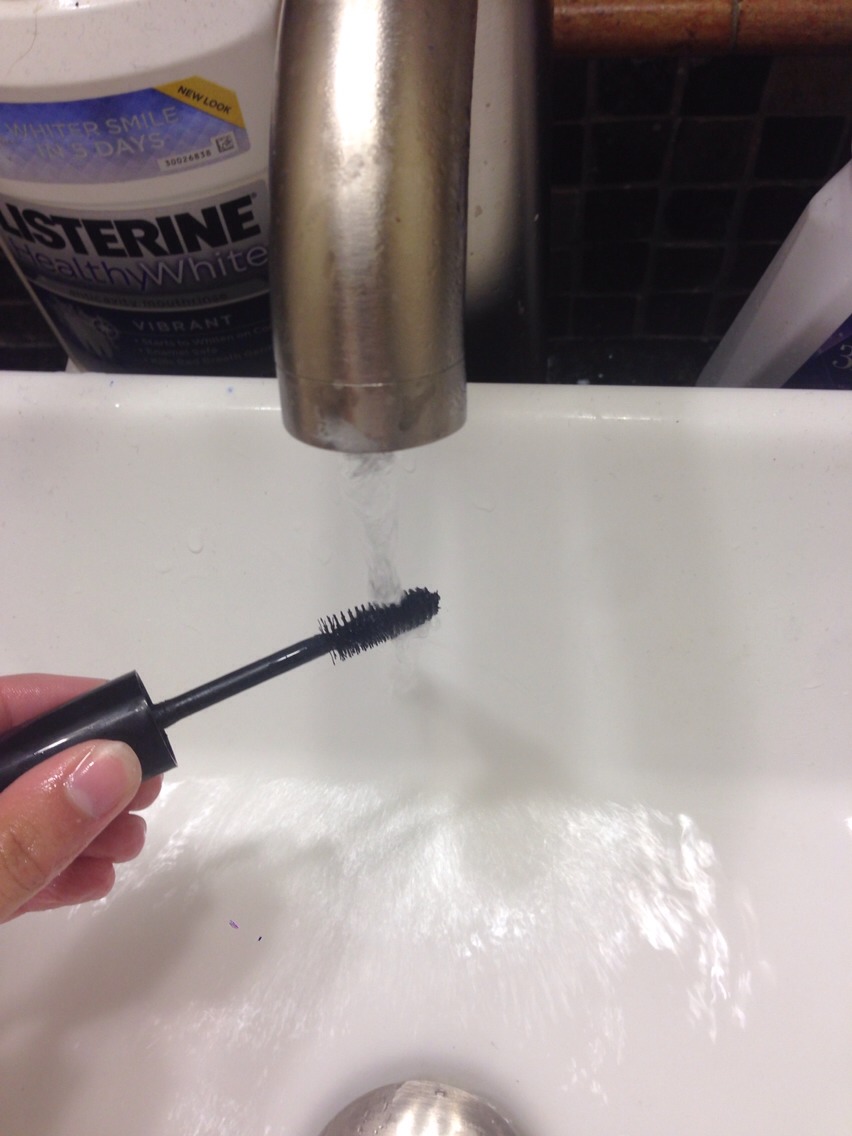 Then, put your brush under the water and scrub ALLLLL of the mascara off of it!