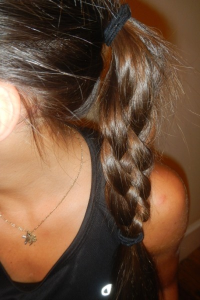 The Five-Strand Braid
Try this hairstyle for your next rain run. Perfect for thick hair, the five-strand braid minimizes the knotting and bunching that comes with inclement weather.
