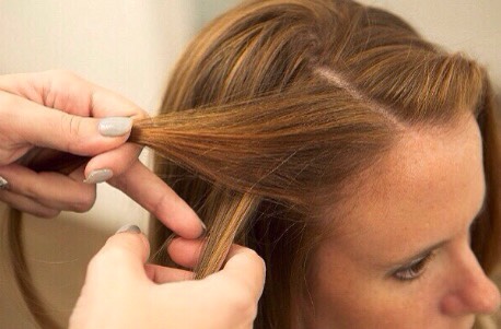Cross the section of your hair along your hair line, over the other section, so it's going away from your face💄