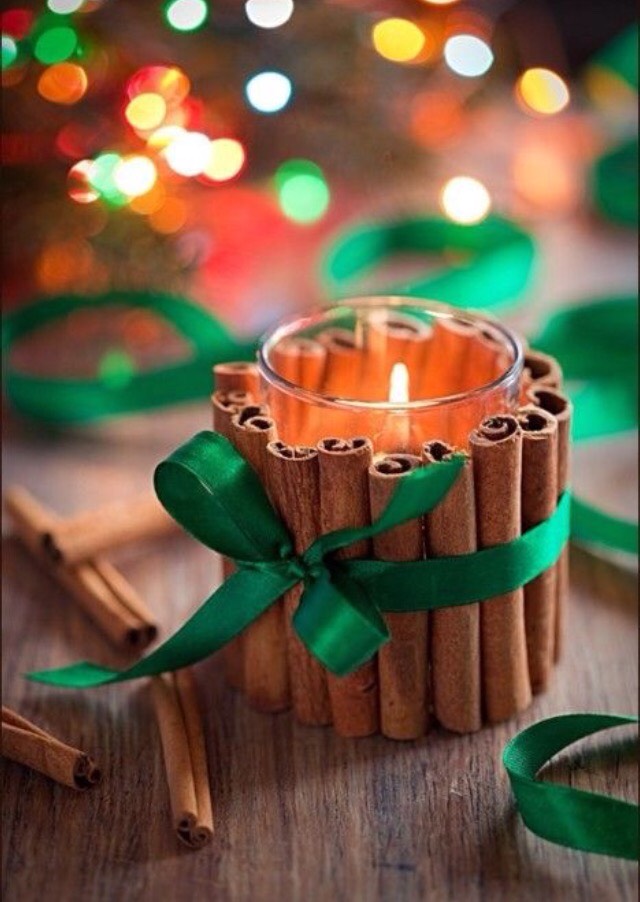 Glue cinnamon sticks onto a candle, tie with a ribbon.
