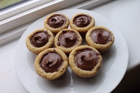 Let cool 15-20 minutes in tin.Remove from tin and place in your mouth.Repeat.Nutella will solidify in about an hour,which then makes them safe to transport!This recipe made enough for 3 batches for me.I kept the dough in the freezer and rolled/baked them rom frozen and they were perfect!
