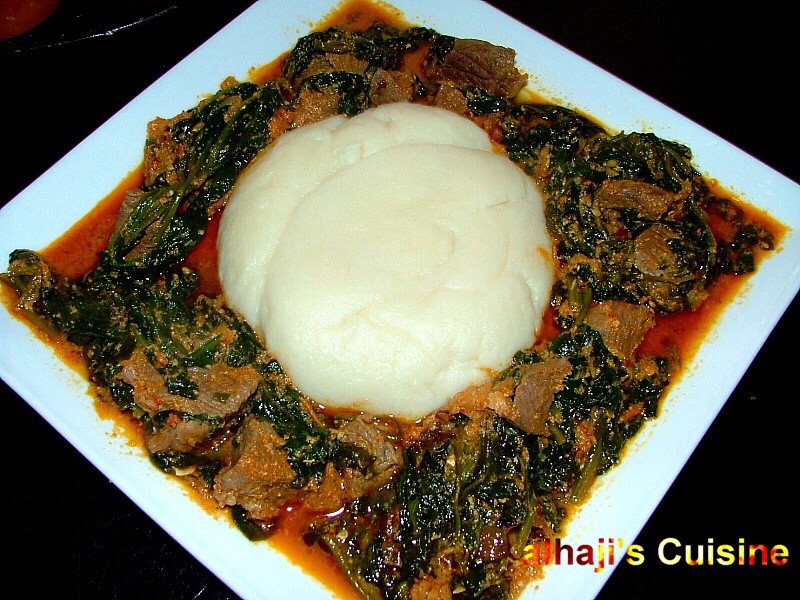 Pounded yam with spinach stew 