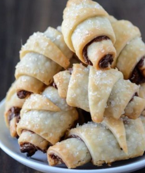 These Nutella filled cornets are so cute! Bite through layers of fluffy pastry and indulge in a cloud of chocolatey goodness:  http://fancylauren.blogspot.com/2013/10/nutella-crescents.html?m=1