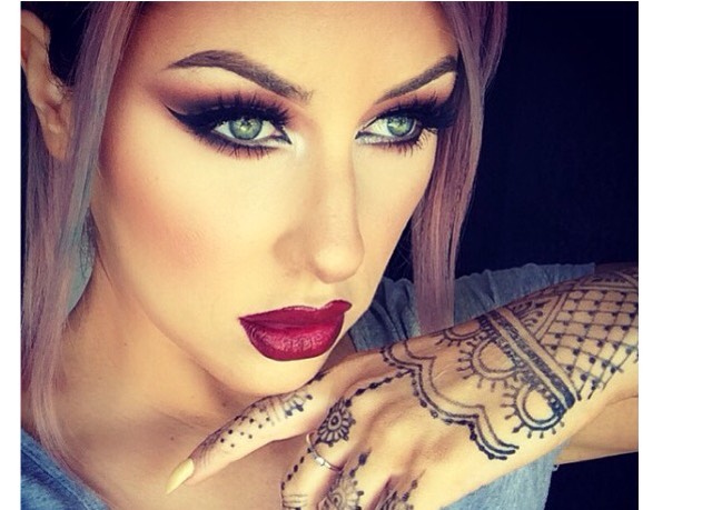 20. Warm Arabic inspired eye, dark cherry wine lip. 