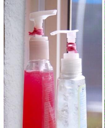 Limit soap by twisting rubber band  around the pump nozzle . 