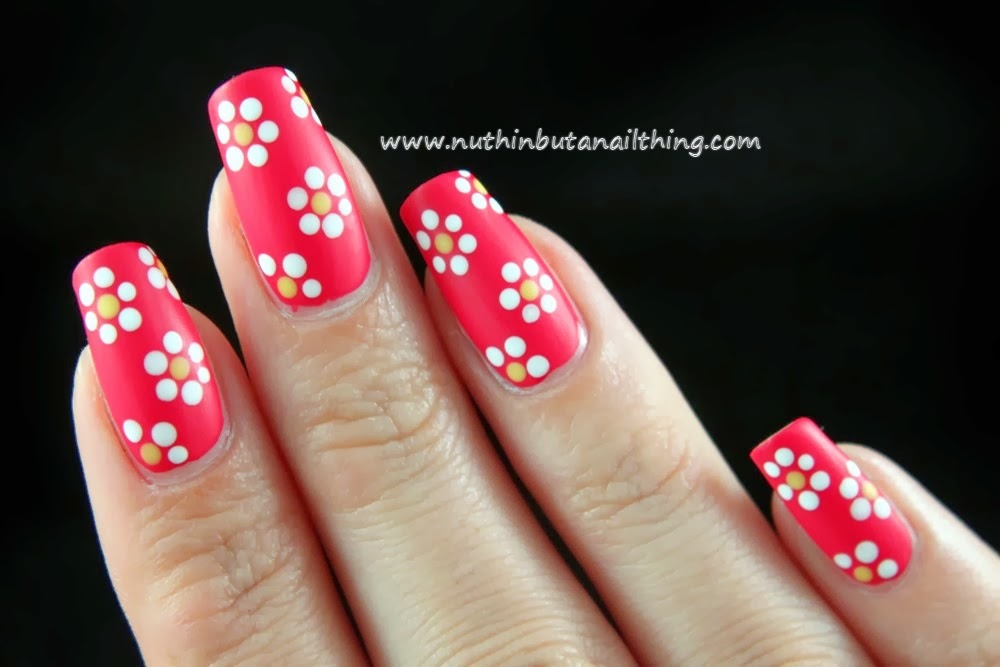 Just do 5 dots with a bent bobby pin in a circle and then add a different coloured dot in the centre :) x
