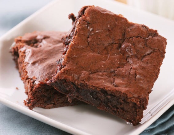 1: Preheat oven to 350F and lightly butter and flour an 8" square pan
 2: Whip your butter and sugar in a large bowl for 5 minutes
 3: Add vanilla and eggs to butter mixture, whipping for 2 minutes between each egg.
4: In a separate bowl mix your flour, cocoa and salt, then sift into the butter bowl