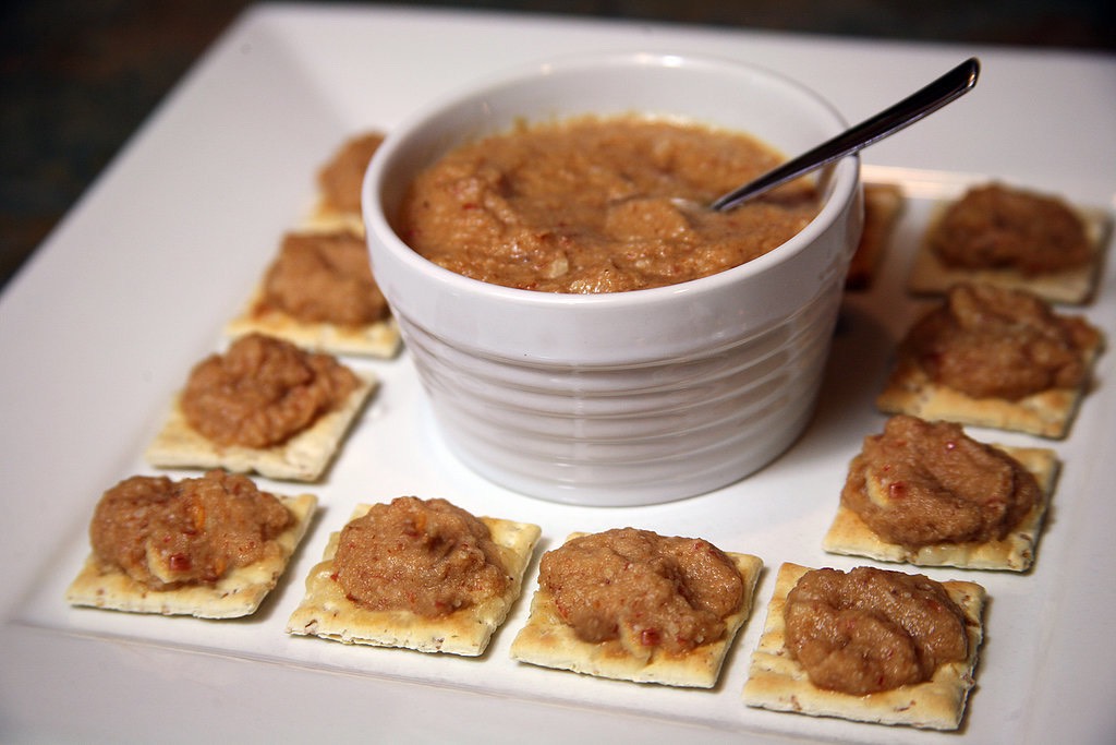 Chunky Apple Orange Almond spread 
Juicy, sweet, and made with just an apple, raw almonds, and a little orange juice, this spread is only 42 calories and tastes delicious served on crackers.