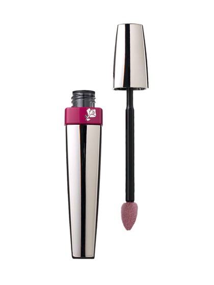 LANCOME LA LAQUE FEVER LIP GLOSS ULTIMATE LASTING FULL COLOR LIPSHINE

The glosses that last the longest are made with silicone.

This one’s silicone base forms a barrier on lips that traps in pigment. It’s concentrated with so much color (shown here in shimmery Plum)