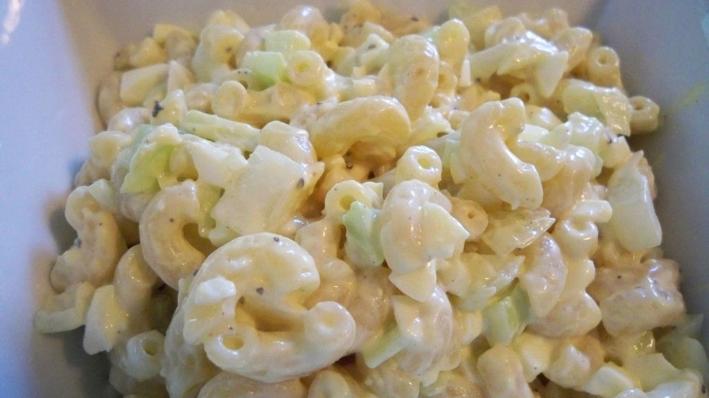 49. Macaroni Salad: Whisk 1/2 cup mayo, 3 tablespoons sour cream, dry mustard, sugar, cider vinegar, salt and pepper. Toss with cooked macaroni, sliced celery and red onion, and parsley.
