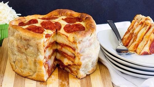 Pizza lovers cake! Take it in. Each bite you get cheese and meat. It looks so mouth watering good. 