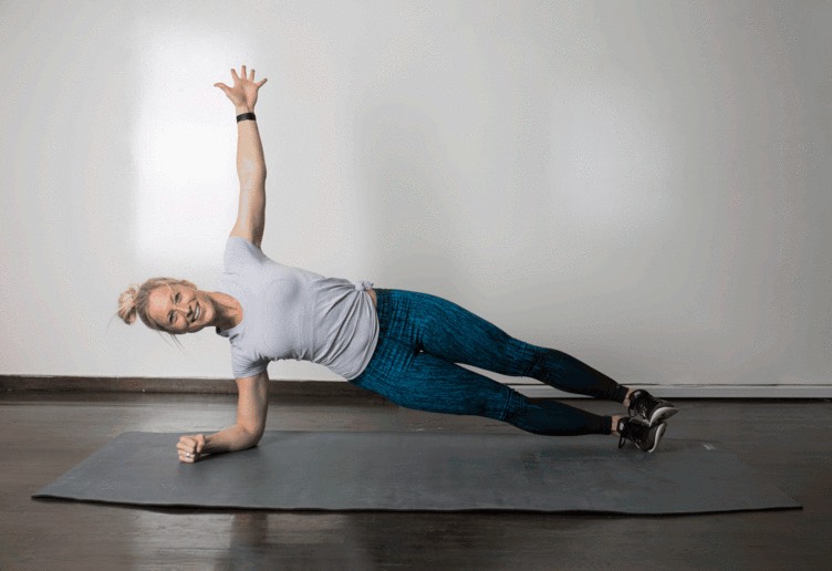 8. Rolling Plank 

Start in low plank position on forearms. Hold for 10 seconds, then roll on to your right elbow, stacking feet, and hold side plank for 10 seconds, engaging your obliques. Roll back through center and over to the left elbow, stacking feet, and hold 10 seconds. Continue to alternate, keeping core engaged and not letting your hips drop.