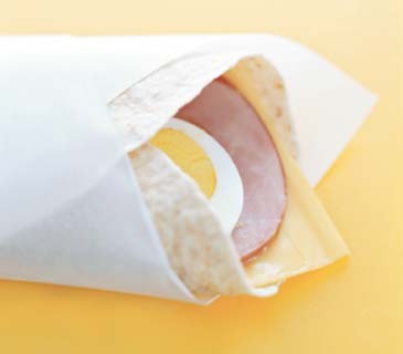 One of the most portable proteins is a hard-cooked egg, but it has no fiber or carbohydrates. So slice it, then roll it in an 8-inch whole-wheat tortilla with a piece of Canadian bacon or lean ham and, if you like, a ½-ounce slice of cheese. Add a tablespoon of salsa for a shot of flavor