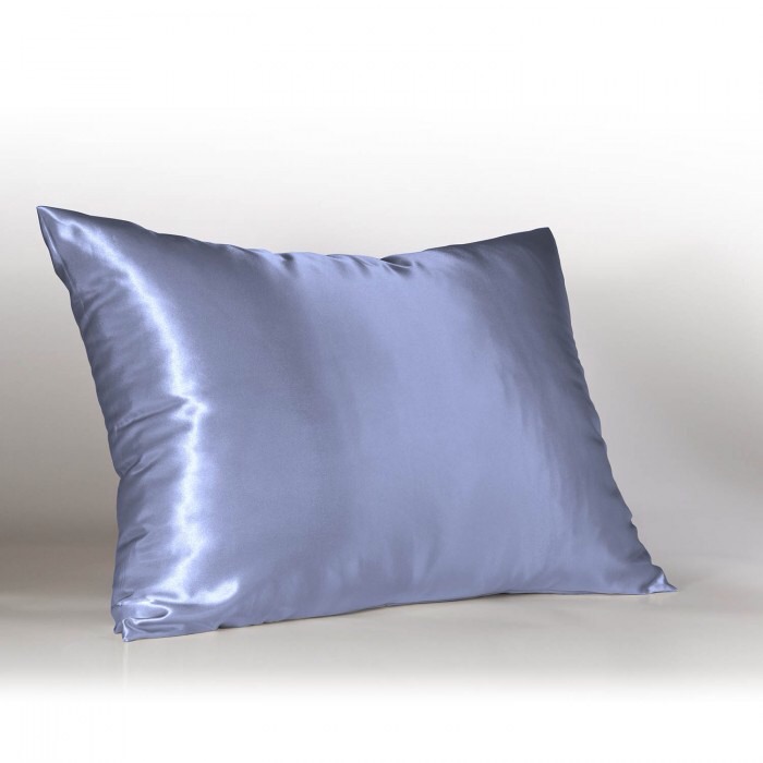 USE A CLEAN SATIN OR SILK PILLOWCASE. These materials help to keep friction between your skin and hair at bay. 
This can also add less creases in your skin. 