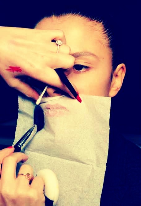 To make your lipstick last all day, hold a tissue over your lips and dust them with translucent powder.