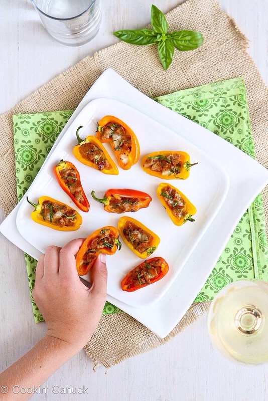 -> Fill each pepper with about 1 teaspoon of the sausage mixture. 
-> Place the stuffed peppers on the grill and cook until the peppers are beginning to soften and the cheese is melted, 5 to 7 minutes.
-> Garnish the peppers with the remaining basil. 