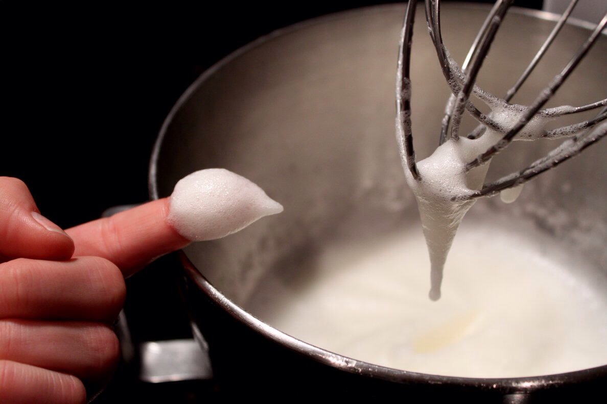Beat egg whites in the bowl of a stand mixer fitted with a whisk attachment until whites are foamy