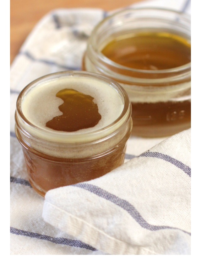 Step 4
Pour the mixture into glass jars. The mixture will begin to solidify. Stir every minute or two, ensuring the honey doesn't sink to the bottom. The mixture takes 5-10 minutes to fully set. Once set, it's ready to use and will keep for a year.