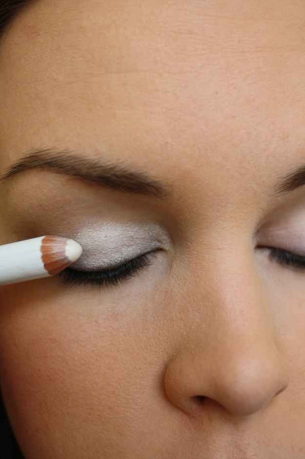 Color your entire lid with white eyeliner to make eyeshadow colors POP.