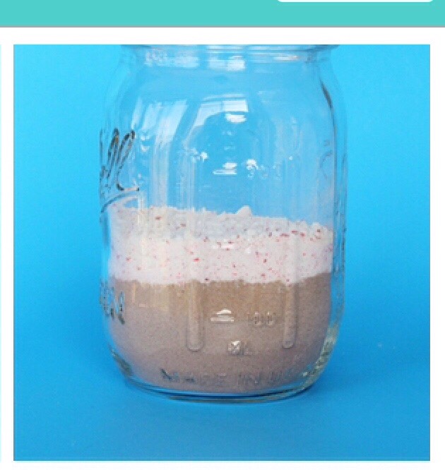 Add the crushed candy canes to the hot chocolate mix. Again make sure it's layered  and spread out really good.