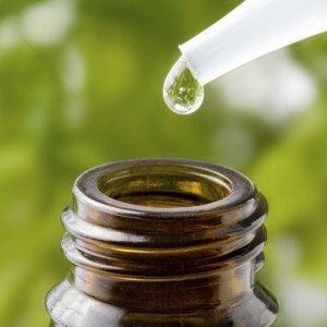 Now drop an oil or two of your choice into the mixture, continuing to stir it.