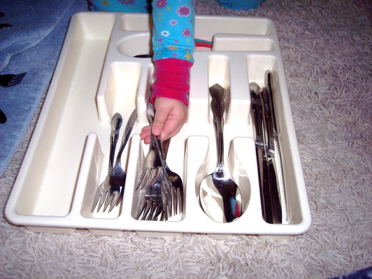 After running dishwasher you can easily grab and return utensils into draw.  