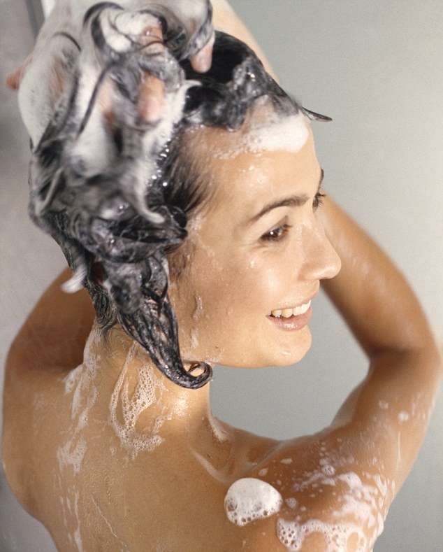 Apply the conditioner. Use your fingers to massage it into the hair, focusing on the roots, tips, and any areas that tend to get the driest. If you have thick hair, separate it into sections and make sure all your hair gets covered. 