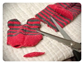 2. Cut out the head shape and then trim a very small portion off the end of the toe. This will become the neck hole where you will stuff.