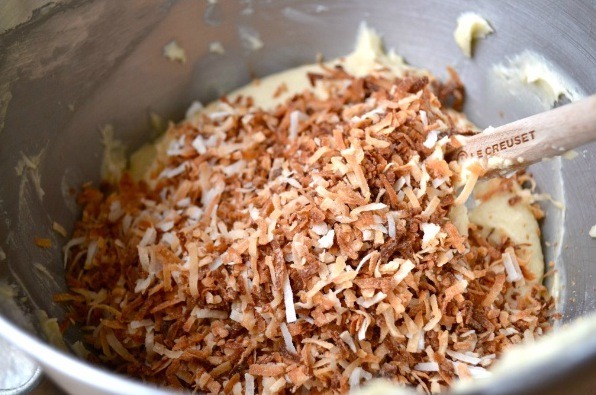 Preheat oven 350 degrees. Grease pan. Whisk together flour, baking powder & salt. In large mixing bowl beat butter & granulated sugar on medium-high until light & fluffy. Add vanilla & eggs. Mixer on low, add flour mixture, alternating w/ two 1/2-cup buttermilk. Then add 1/4 cups coconut.