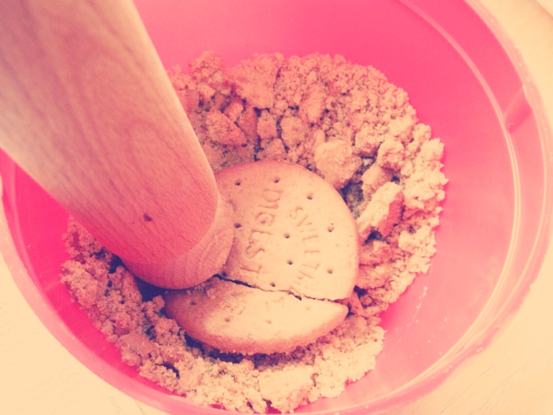 Take your biscuits (as much as you want, but I like to use 28 as a guide), put them into a bowl, blender etc and crush them into little crumbs, I tend to use the end of a rolling pin to crush the biscuits.