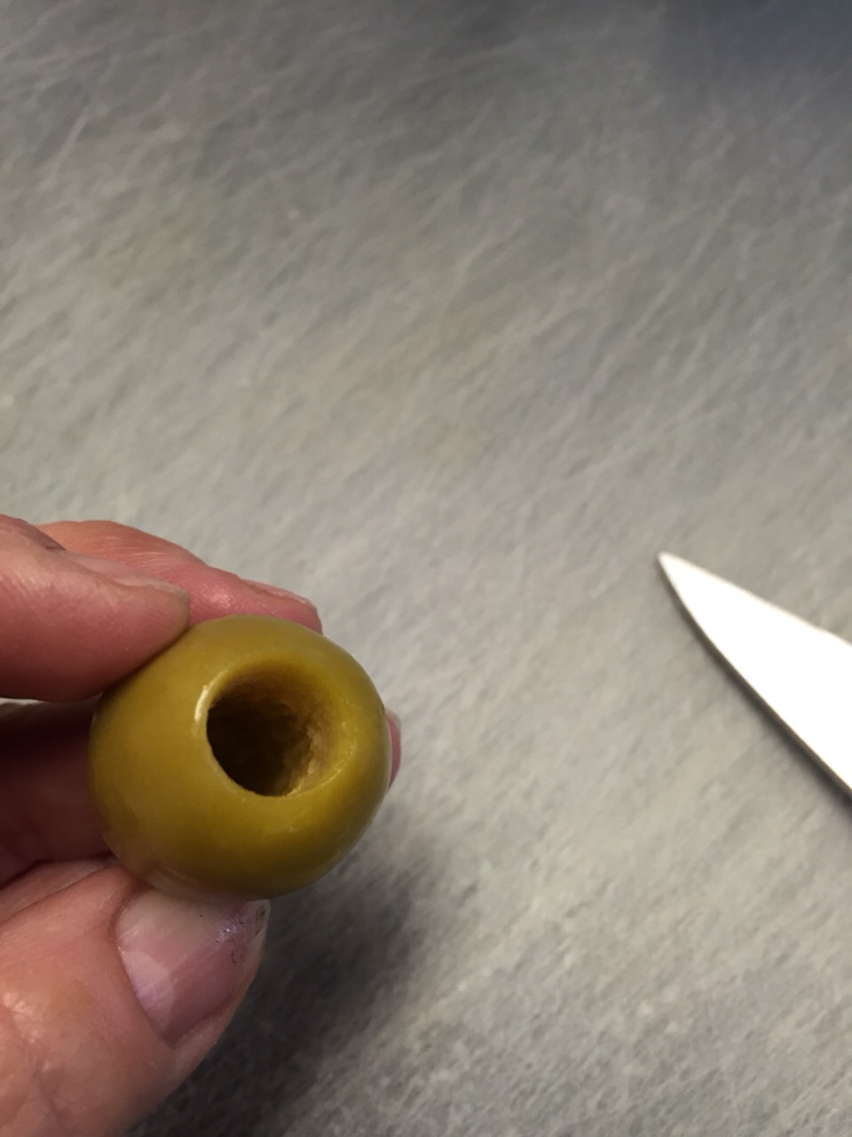 Slit olives for stuffing