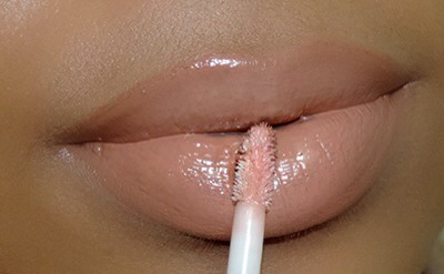 APPLY GLOSS

Finish off with a gloss. This step will help add depth to your nude pout. Always remember that layering is the key to long lasting lip color, no matter the color.