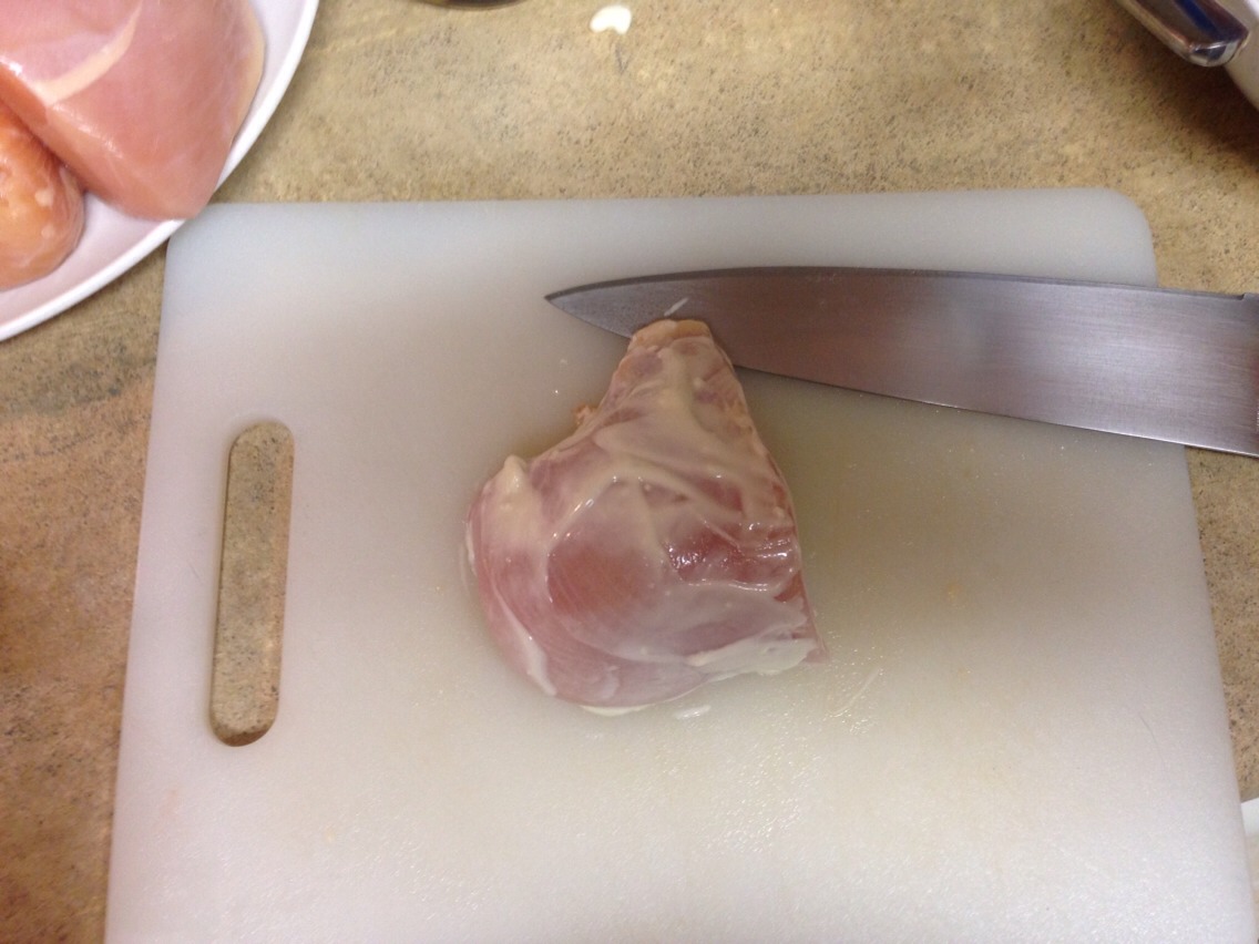 Bigger breasts can be cut in half for faster cooking. Cover the breast in blue cheese with a knife (you can roll it in the bowl if you like, but I find this to be too messy). Do both sides!