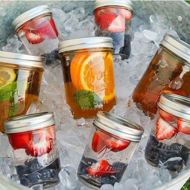 It's Perfect For Summer Parties
If you're hosting an outdoor party this Summer, keep a variety of fruit waters in a cooler of mason jars so your guests can stay hydrated all night long. 