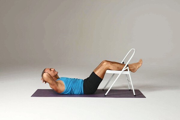 Elevated crunches
Sets: 3
Reps: 15