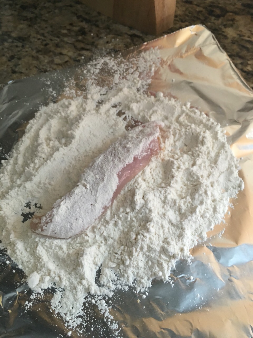Drop the pieces in some flour 