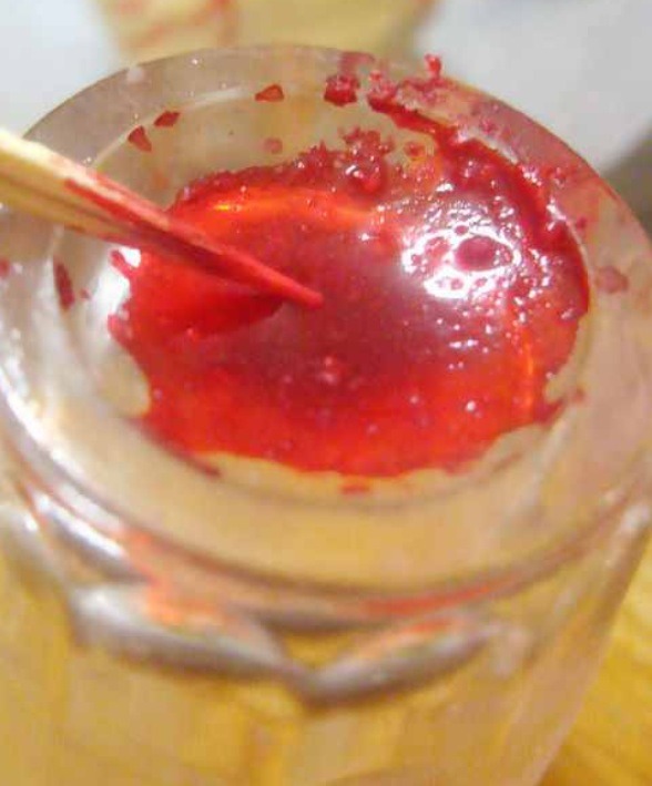 Take slides out of fridge.  Using a tooth pic or a bamboo skewer, paint on the blood circle in the center.  You don’t need too much.  A small droplet off the tip of your tooth pic will be enough.  If you put too much on, it will run all over the slide and make a huge mess. Refrigerate again until 