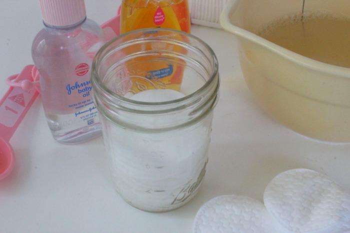 Continue to add about 10 pads at a time pouring solution over each set to allow coverage.