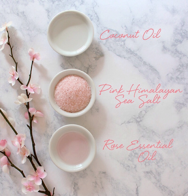 INGREDIENTS | 
(+) 1 tbsp room temperature COCONUT OIL
(+) 2 tbsp finely ground PINK HIMALAYAN SALT  or SEA SALT
(+) 3-4 drops ROSE ESSENTIAL OIL
 INSTRUCTIONS | Simply whisk these 3 ingredients together with a fork for a ready-to-use scrub! Use on hands, feet, arms, + legs. Store leftovers in an airtight container.
