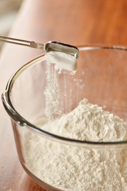 First Mix 2 cups of the flour with the baking soda and baking powder in a mixing bowl.

