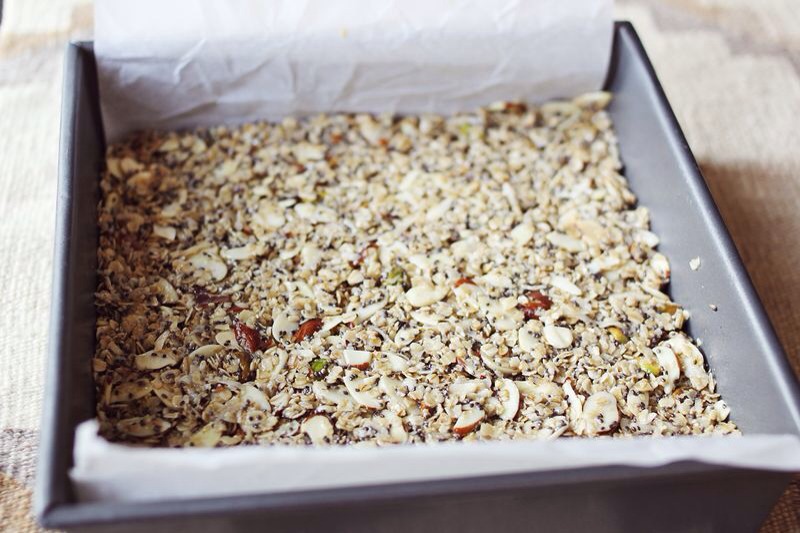 Press the granola mix into the pan. Bake at 300°F for 25-28 minutes.