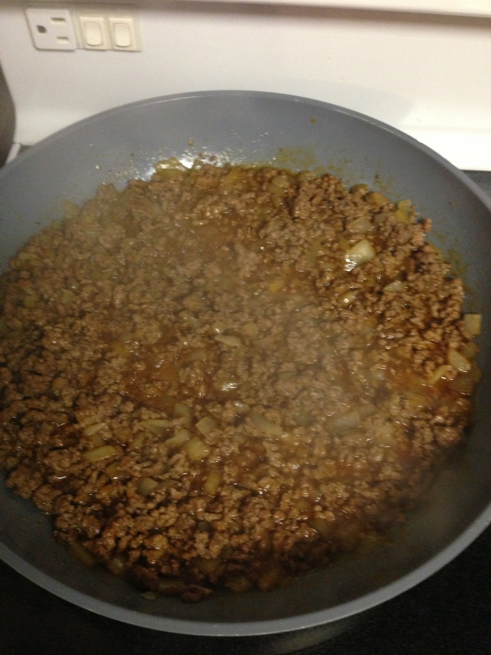 Add mix to meat in frying pan and cook until all liquid is absorbed