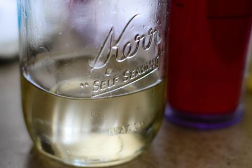 Starbucks usually pump their "classic syrup" in the drink. It's a clear syrup so I'm guess its a basic "simple syrup". To make a simple syrup, bring 1 cup of water and 1 cup of sugar to a boil and let it cook until the sugar dissolves. Let the substance cool in the fridge and now you have your syrup