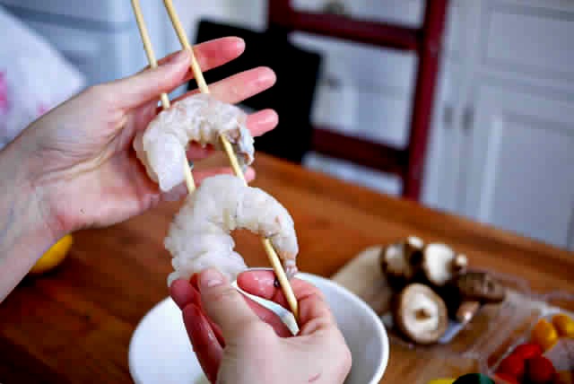  To keep food from slipping off during cooking and turning, 
 use two parallel skewers rather than a single skewer. 