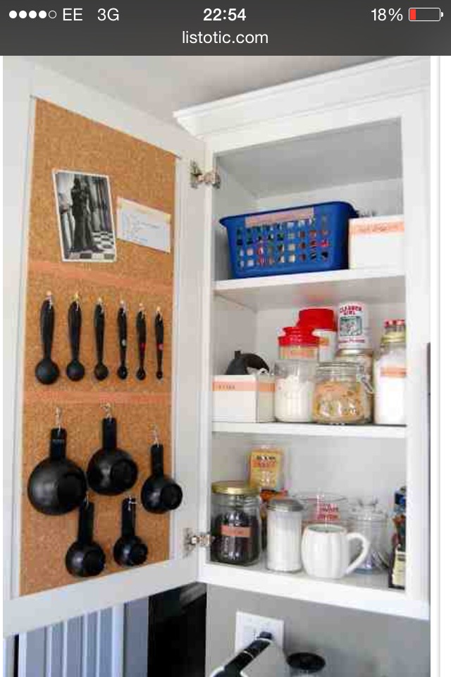 9. Interior cork board cupboards- Attach a cork board to the inside of your cabinet(s) to pin recipes, a measurement converter, and hooks for hanging measuring spoons and cups.
