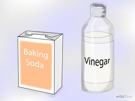 Make a paste with baking soda and vinegar. Combine enough baking soda and white vinegar in a glass or plastic bowl to form a foamy, thin paste